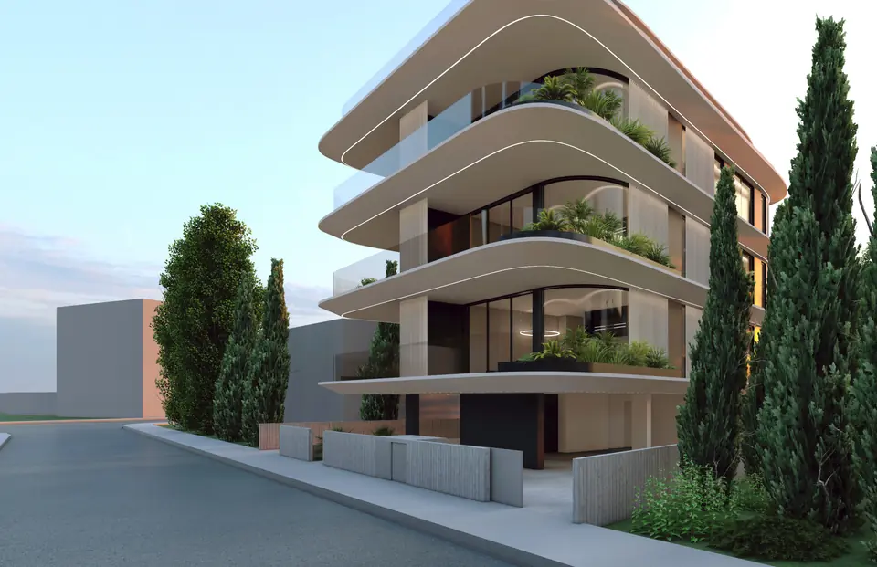 Sabih Residences seen from the street, framed by cypress trees