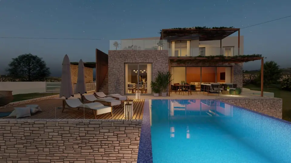 A villa with an infinity pool at dusk in the Paphos hills