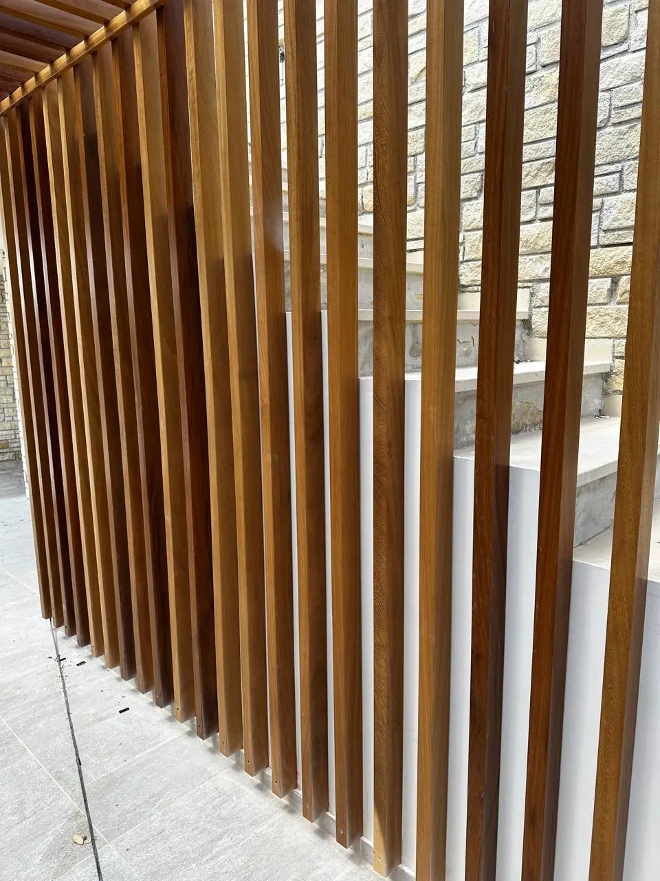 Timber screen detailing on a hillside villa